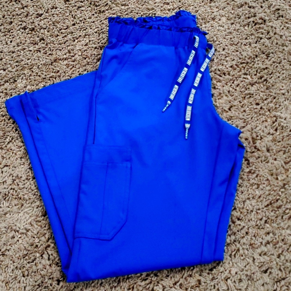 Never worn Med Couture royal blue scrub pants.